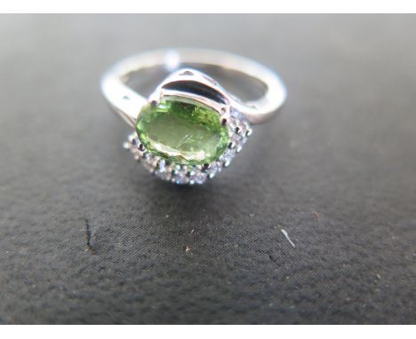 An 18ct white gold diamond and tourmaline ring size M/N - approx weight 3.7 grams - light usage marks 