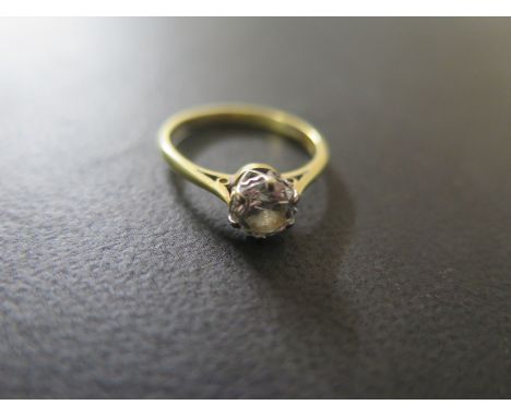 An 18ct yellow gold solitaire diamond ring, the central diamond approx 0.79ct, ring size K, approx 2.3 grams, diamond bright 