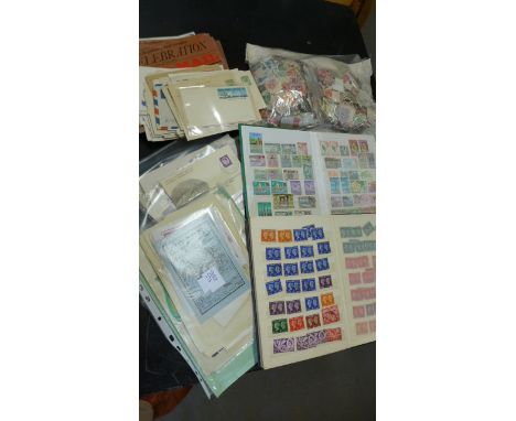 A Collection of Stamps to include approx 1040 in two stock books - assorted loose stamps and First Day Covers 