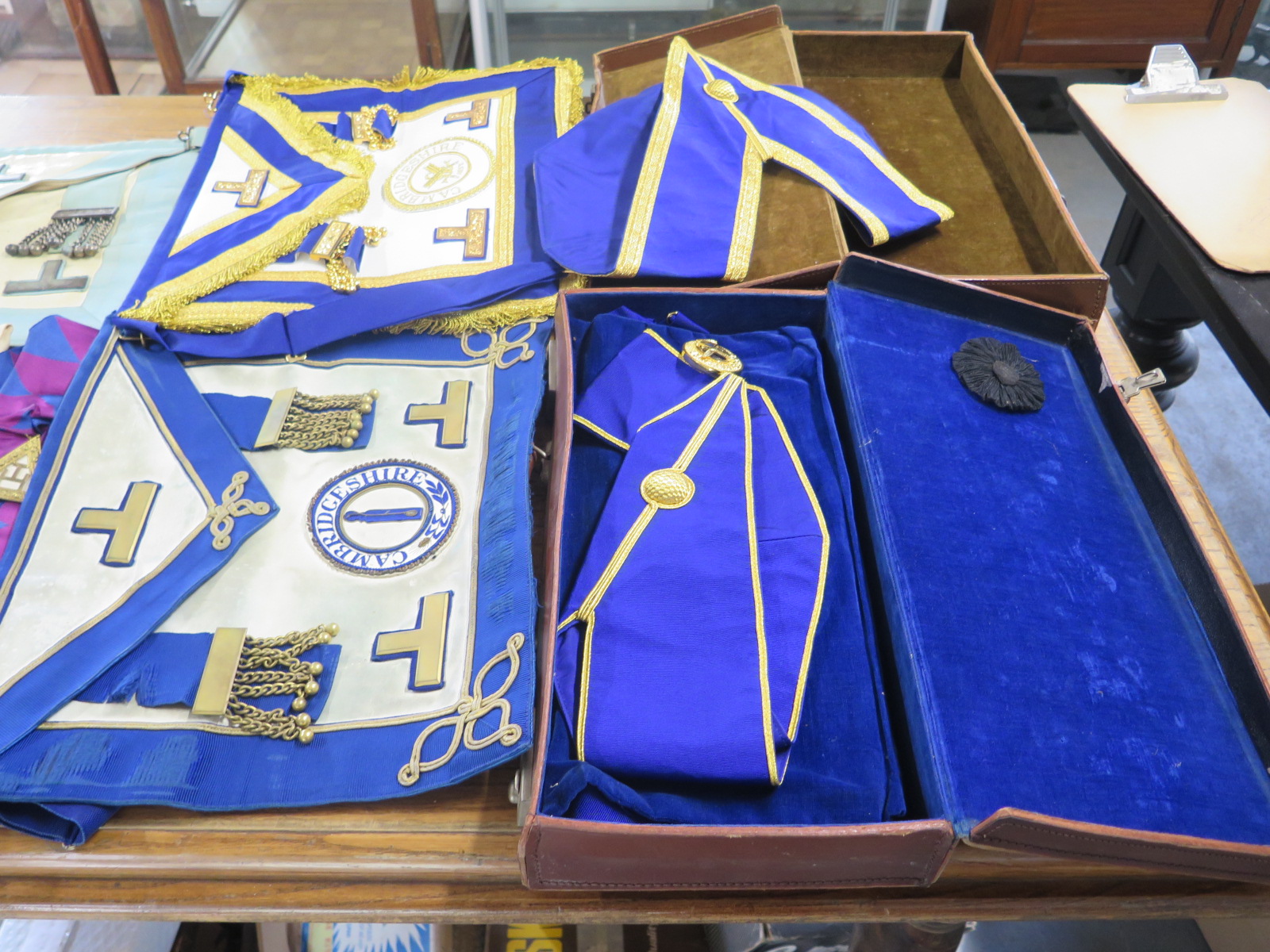 Two cases of Masonic Regalia, Sashes and Aprons