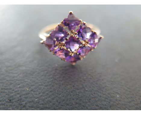 A 9ct yellow gold and amethyst dress ring size R/S - approx weight 2.7 grams - light usage wear 