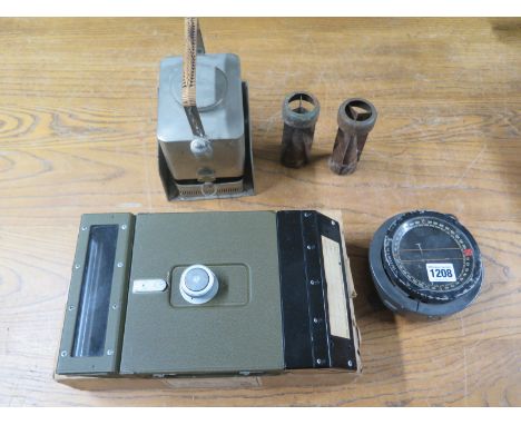 Military Items including a boxed M6 Periscope Tank Sight, an Aerocraft Navigational Compass MPE P8 No 32393 H, two explosives