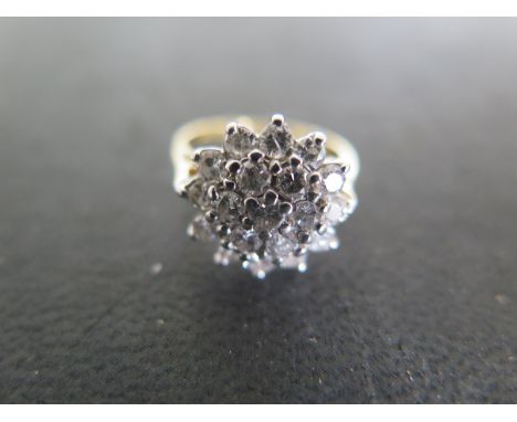 An 18ct yellow gold diamond cluster ring size H - approx weight 4 grams - Width 13mm 