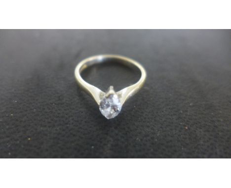 An 18ct gold ring set with 0.30ct marquise cut diamond - size K, 2.6 grams - light surface scratches and usage wear 