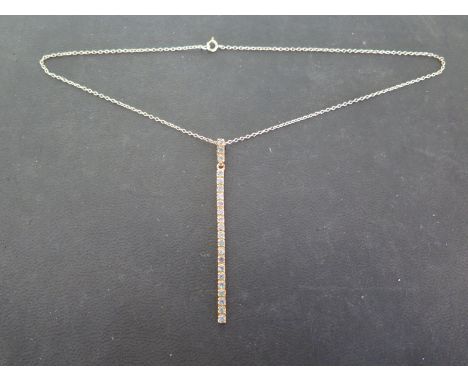 A blue diamond stick pendant suspended on a 9ct yellow gold chain - Length 34cm - approx weight 3.9 grams - light usage wear 