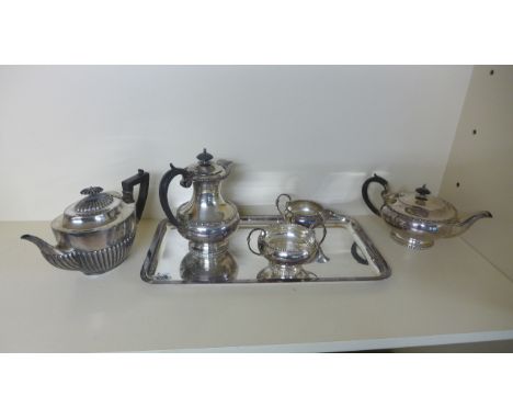 A silver enamel dressing table set - five pieces - slight damage to one brush, otherwise good and a four piece plated tea-set