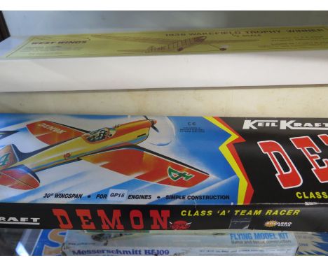 Three model aircraft kits, includes 1936 Wakefield Trophy Winner and a Kiel Kraft Demon 