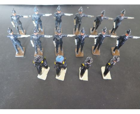 Twelve lead figure Britain's Traffic Policeman, one with arm missing with four A R P Wardens 