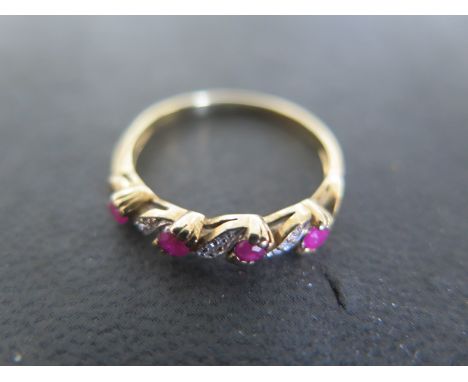 A 9ct yellow gold ruby and diamond ring size R/S - approx weight 2.3 grams - Light surface scratches and usage wear 