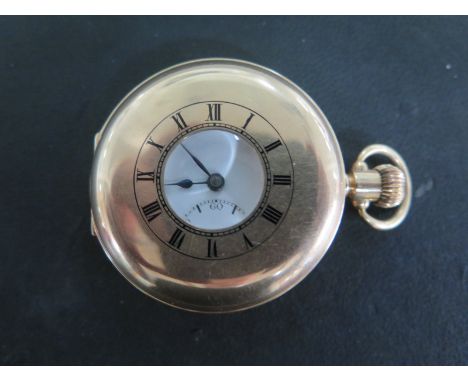 A 9ct Yellow Gold Cased Half Hunter Pocket Watch, 15 Jewel Level Swiss Movement, outer case with blue enamel Roman numerals, 