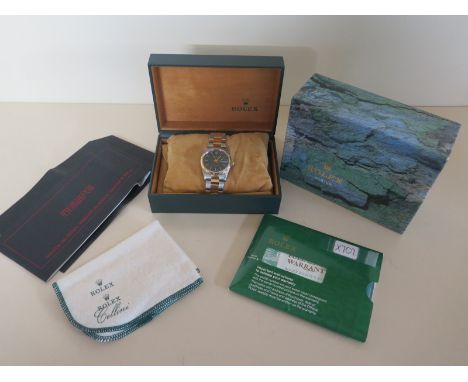 A Rolex Gents Oyster Perpetual Datejust Superlative Chronometer Bi-Metal Bracelet Wristwatch with blue dial, 36mm wide, inclu