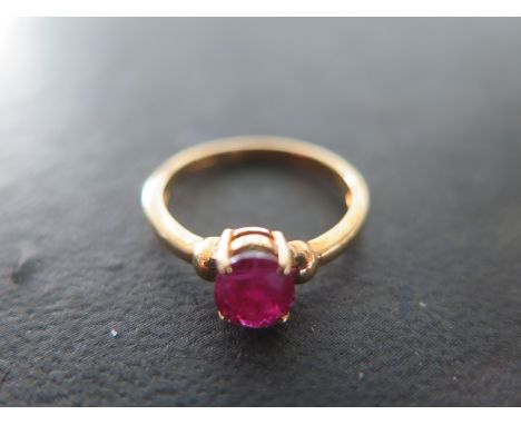 A 9ct yellow gold and ruby ring size N - approx weight 2 grams - light usage wear 