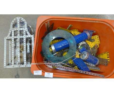 A tub of Meccano including a part built clock 