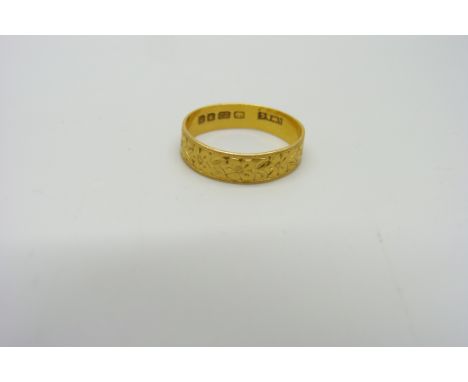 A 22ct gold wedding ring, 2.6g, P 