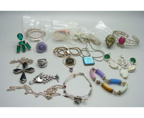 A collection of silver and silver mounted jewellery including a multi colour jade bracelet and an articulated fish pendant wi