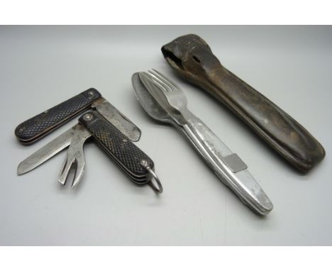 A WWII campaign knife, fork and spoon set, marked Compactum and two penknives, one marked 1943 