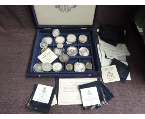 A collection of modern Coins including Marilyn Monroe Republic of Marshall Islands 4 Coin set in plastic wallets with cert, D