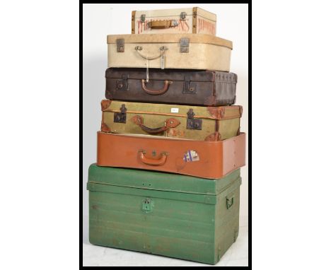 A selection of vintage 20th century trunks to include an industrial metal painted green hinged lid container, and a selection