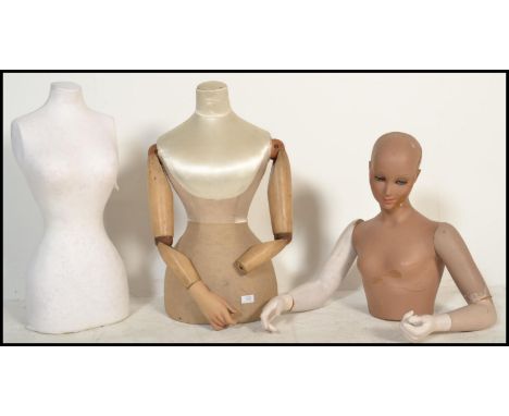 A collection of vintage 20th century shop mannequin - torso's. Half body with articulated arms, one with fabric body etc