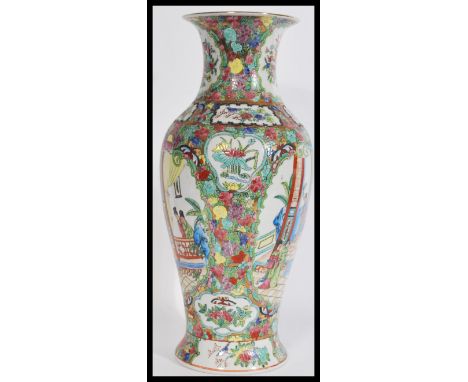 A 20th century Chinese famille rose begonia shaped vase having hand painted decoration of birds , insects ,court scenes figur