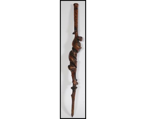 A early 19th Century Georgian briar nobble twist knot walking stick of organic form with metal feral to the base with a bone 