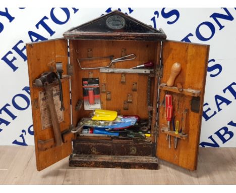 ANTIQUE ARMY AND NAVY TOOL CABINET WITH CONTENT SUCH AS HAMMERS SCREWDRIVERS ETC