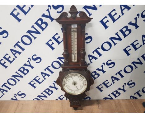 LATE 19TH CENTURY EARLY 20TH CENTURY ANEROID BAROMETER IN CARVED OAK 87CM