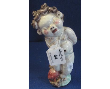 20th Century ceramic figure of a giggling cherub, believed to be by Walter Bosse, glazed terracotta.  16cm high.(B.P. 24% inc