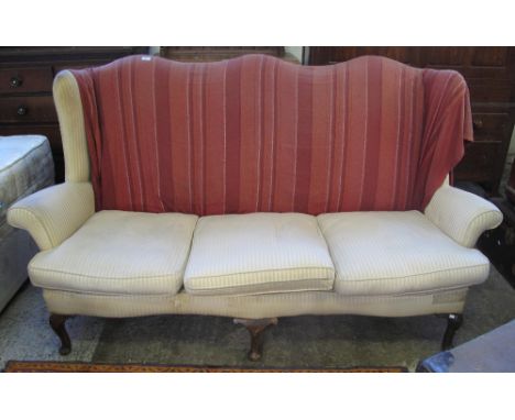 Early 20th Century wing back three seater sofa on cabriole legs.(B.P. 24% incl. VAT)