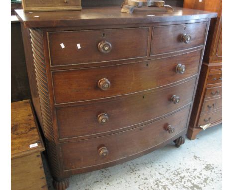 Victorian mahogany bow fronted chest of two short and three long drawers with turned handles, on fluted legs.(B.P. 24% incl. 