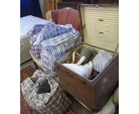 Three bags of knitting wool together with a vintage suitcase/trunk containing wool.(B.P. 24% incl. VAT)