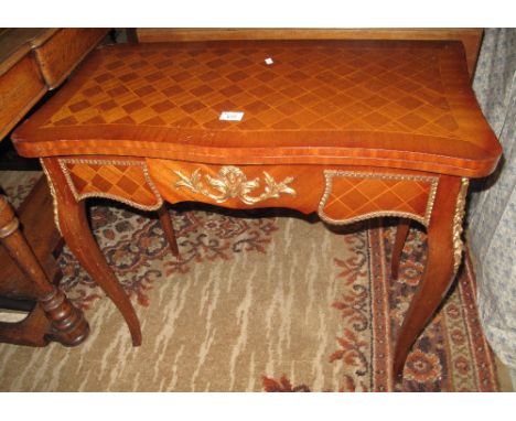 20th Century French style swivel card table on cabriole legs.(B.P. 24% incl. VAT)