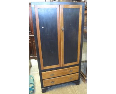 Mid 20th Century oak blind panelled two door cupboard on bracket feet. (B.P. 24% incl. VAT)