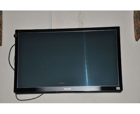 A PANASONIC 42' FSTV, wall mounted with bracket