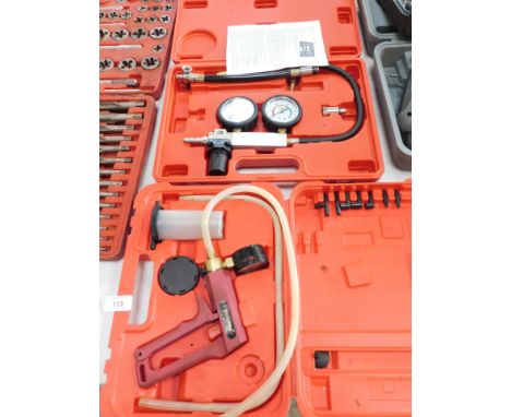 A Neilsen engine pressure lost test, and hand held vacuum pump. (2)