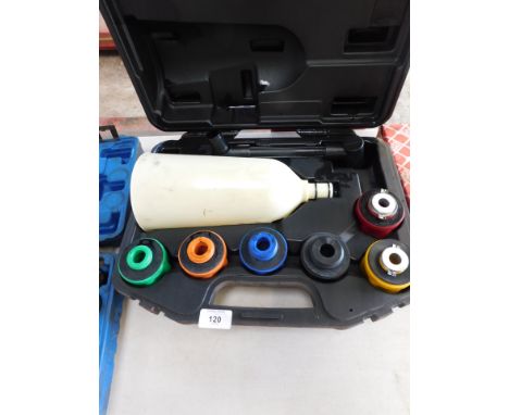 An engine oil filling device, with adaptors.