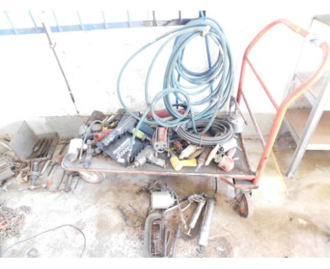 Various tools, etc., including grease guns, G clamps, valve lifting tools, pneumatic drills, etc. 