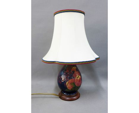 Moorcroft 'Bullfinch' pattern table lamp base, on wooden stand, complete with shade, 22cm excluding fitting 