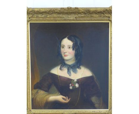Half length oil on canvas portrait of a woman, apparently unsigned, contained within an ornate gilt frame, size overall 