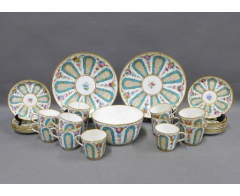 English porcelain part tea set, blue and white panels with hand painted floral sprays, comprising 12 various cups, 12 saucers