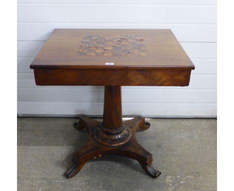 Mahogany games table, rectangular top and two drawers, on a tapering column and platform base with scroll feet, 76 x 73 x 63c