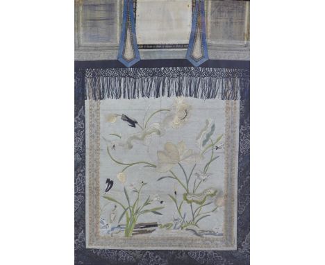 Japanese silk needlework panel depicting flowers, birds and insects, within a stylised border, framed under glass, 50 x 72cm 