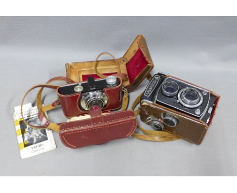 Vintage cameras to include Argus Model AF Candid Camera in case and with guide book and a Yashica - A Copal camera including 
