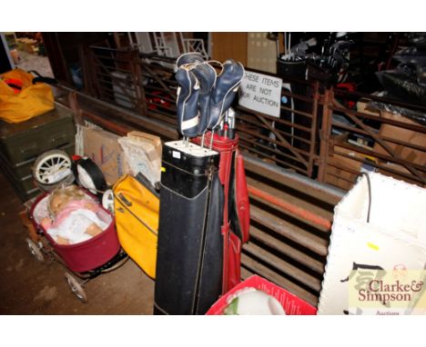 Two golf bags and contents of nine irons and one putter, male right handed golf clubs; and four male right handed Dunlop wood