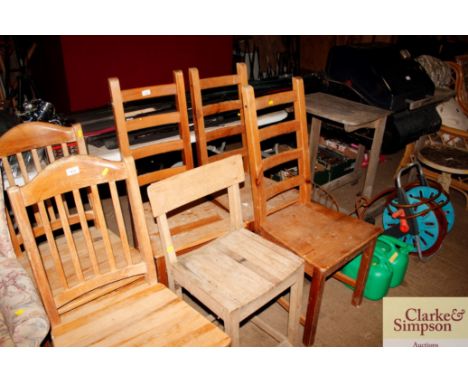 Three ladder back dining chairs 