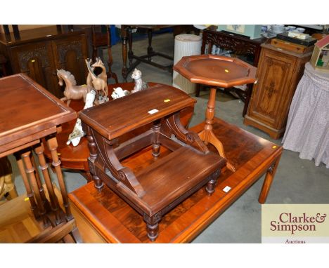 A two tier mahogany step and a yew wood finish occasional table