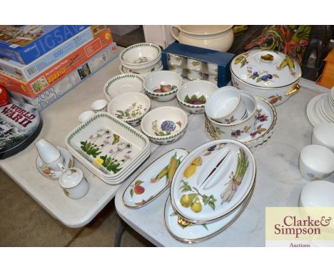 A quantity of Royal Worcester "Evesham" dinnerware and a quantity of Portmeirion 