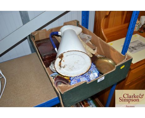 A box containing a large enamel jug; various glass ornaments etc