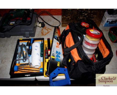 A tool case with various fasteners, hand tools, saw, decorators tools etc. 