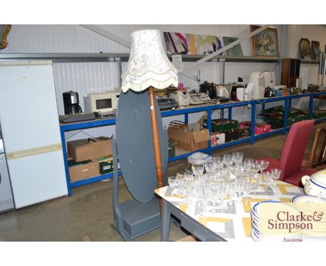 An oak turned column standard lamp and shade